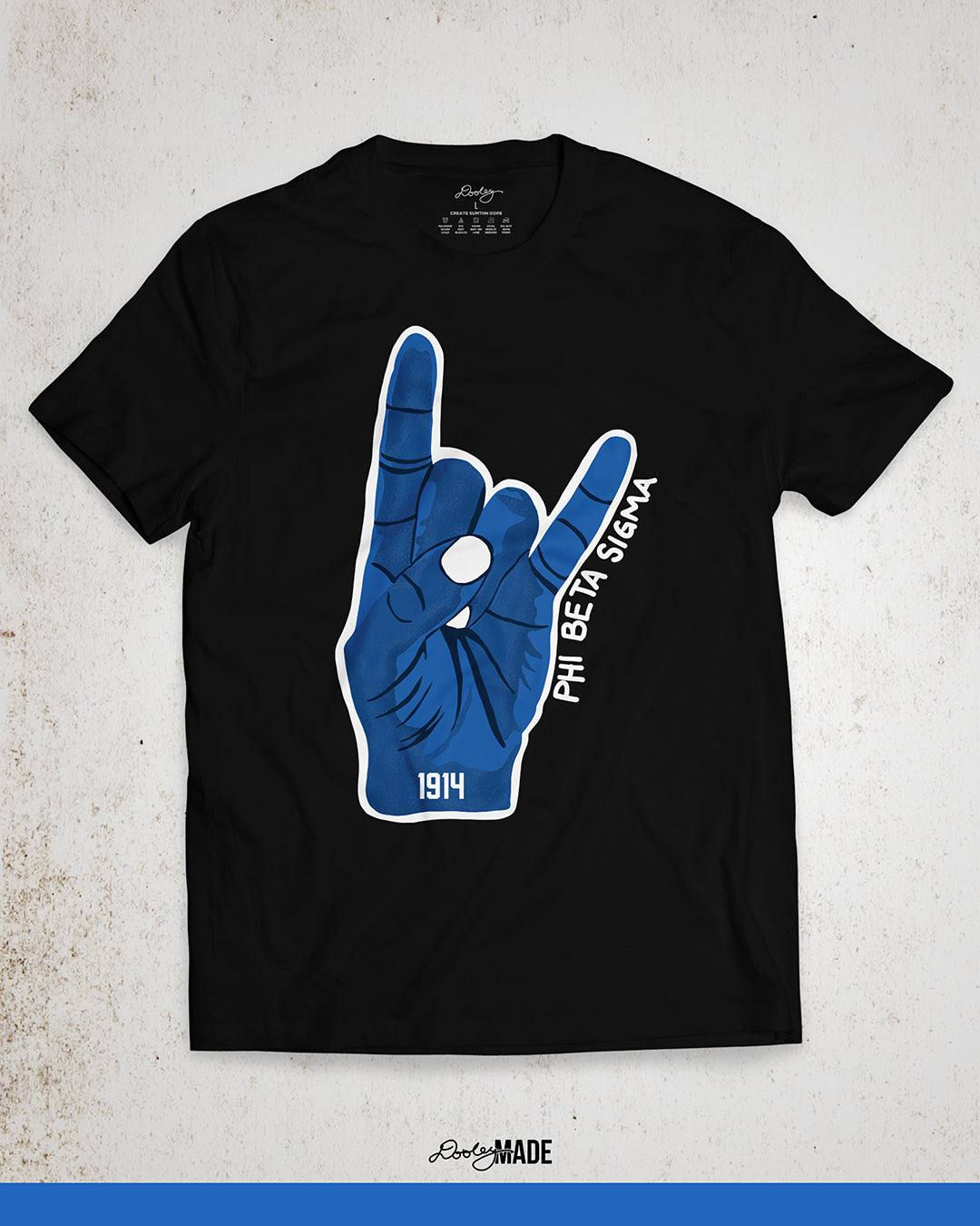 An image of a black Phi Beta Sigma Fraternity, Inc. Shirt featuring a large Sigma Hand Sign. 1914 is written on the wrist in bold black font. 