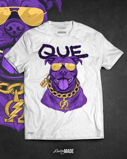 A photo a white shirt with a graphic of an Omega Psi Phi themed Pit Bull Dog wearing gold aviator sunglasses and a gold Omega Psi Phi necklace.