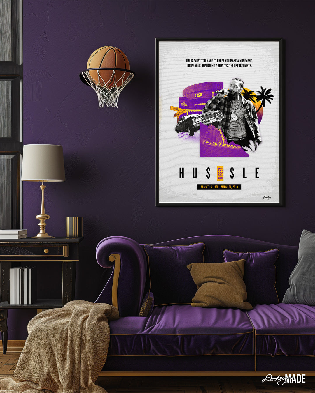 Framed Nipsey Hussle printed artwork titled "Sunsets on Slauson" in a dark and moody living room featuring Los Angeles purple and gold, The Marathon store on Slauson, a Chevy with "Nipsey" plates, The Los Angeles Theatre, a sunset, and palm trees. Add a touch of LA to your space with this dope Nipsey Hussle print!